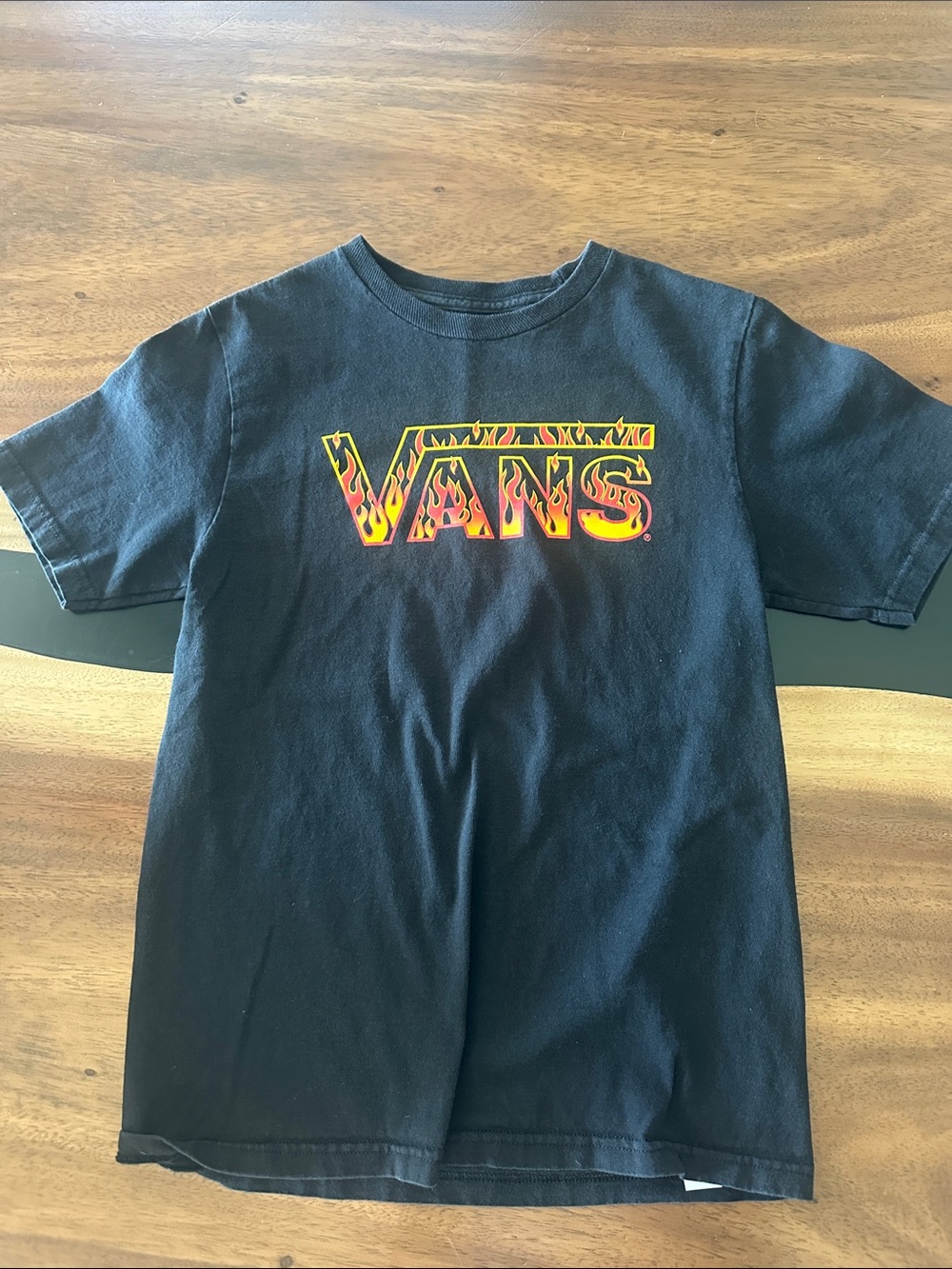 Youth Boys Vans Black Tee with Yellow-Orange Flame Logo
